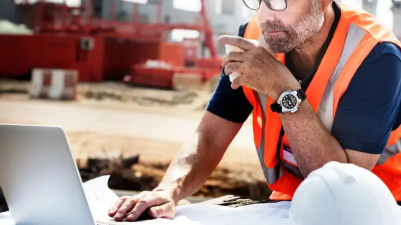 man working on laptop