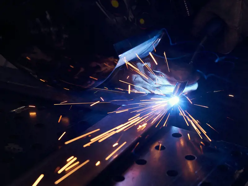An arc welder at work